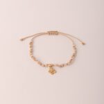 Pulsera Vera Hilo Nudo Tonos Nude - Mariposa Calada