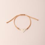 Pulsera Lia Snake Beige - Corazón mapa del Perú calado